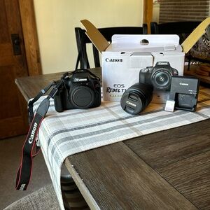 Canon EOS Rebel T100 Kit. BRAND NEW. NEVER USED.
